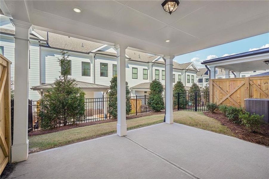 Exterior details and patio area of a home in Millcroft Townhomes, Buford (Image 3).