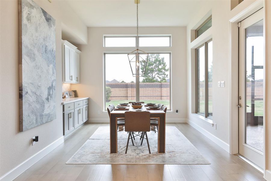 Furnished interior view inside a new home in Elyson, Katy (Image 39).