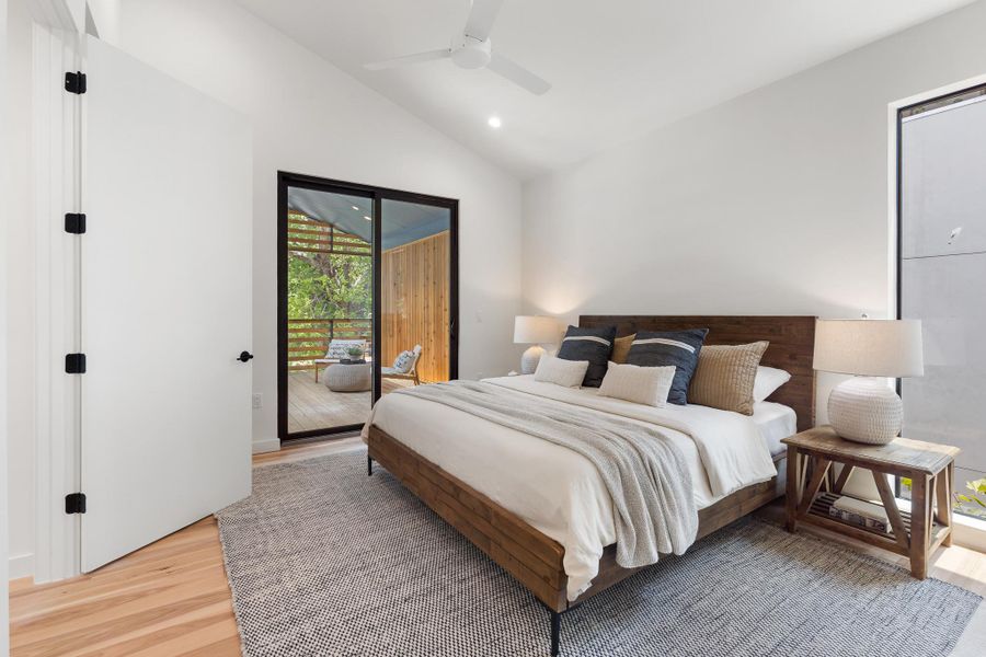 The spacious primary suite offers a peaceful retreat with direct access to a protected outdoor deck. The spacious primary suite offers a peaceful retreat with direct access to a protected outdoor deck.