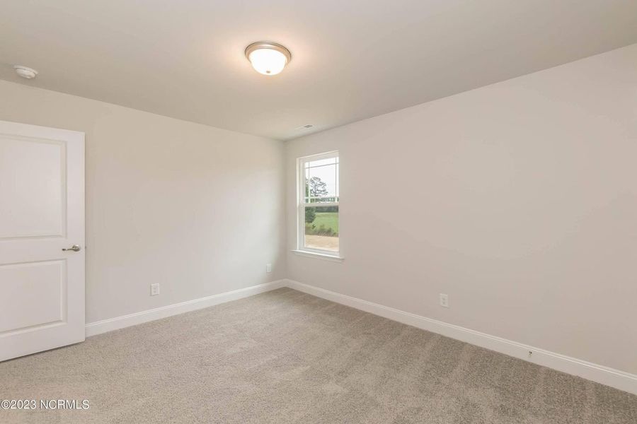 Representative unfurnished interior of a home built from the 3105 by Adams Homes in Parkland Place, Pace (Image 26).