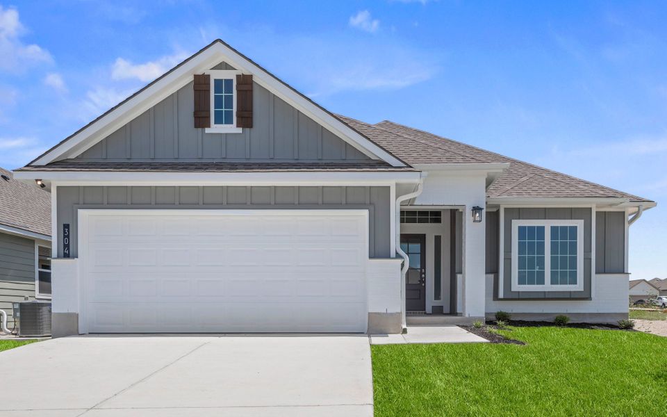 Front exterior of a new home in Eastern Wells, Jarrell, TX, highlighting curb appeal (Image 1). Front exterior of a new home in Eastern Wells, Jarrell, TX, highlighting curb appeal (Image 1).