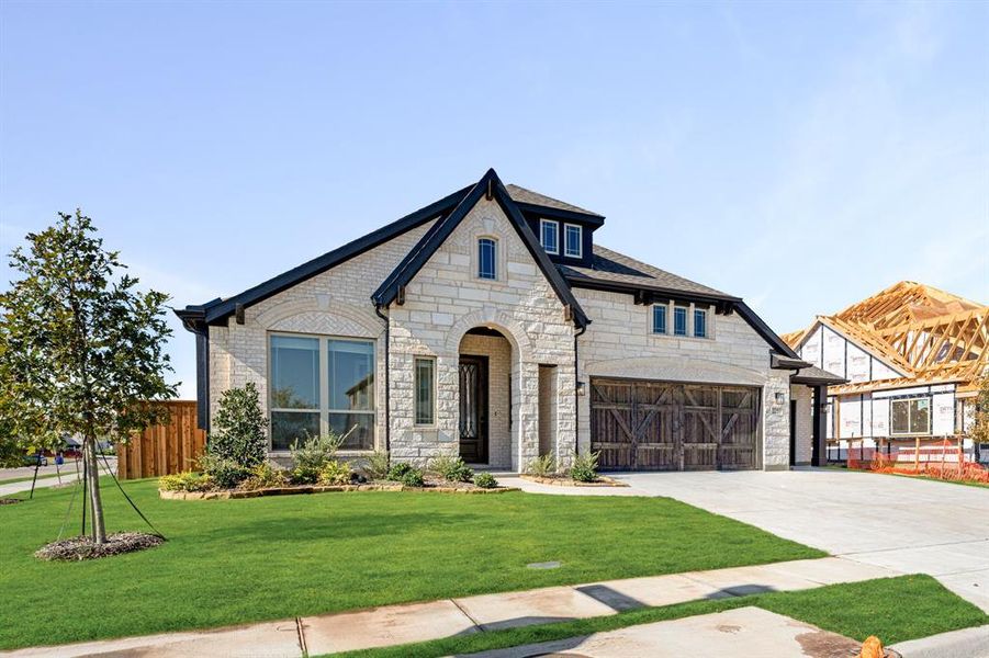 Front exterior of a new home in Stone River Glen 60s, Royse City, TX, highlighting curb appeal (Image 2). Front exterior of a new home in Stone River Glen 60s, Royse City, TX, highlighting curb appeal (Image 2).