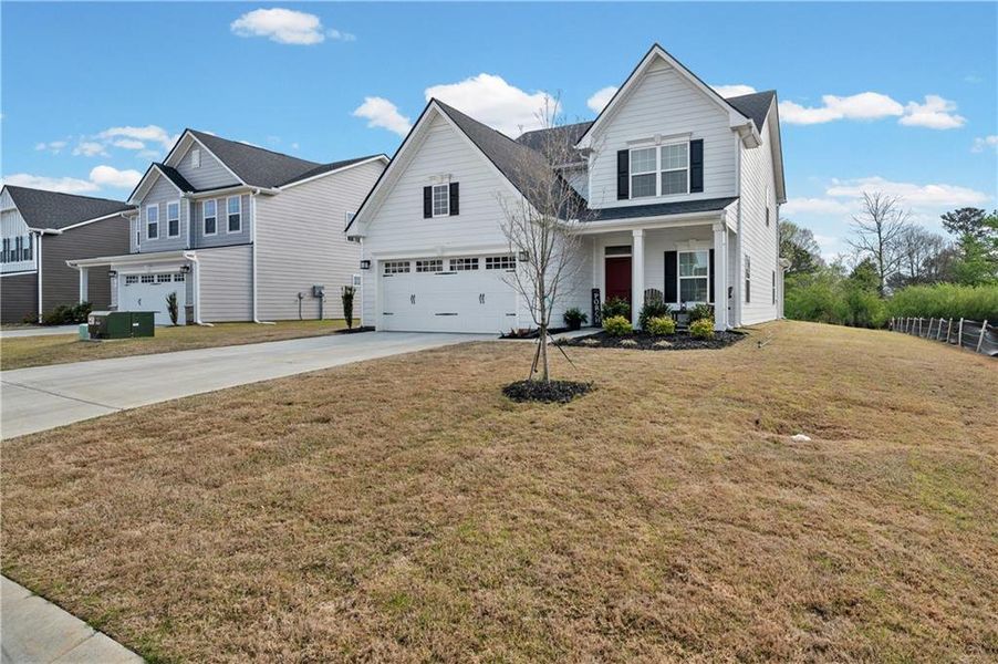 Front exterior of a new home in , Calhoun, GA, highlighting curb appeal (Image 27).