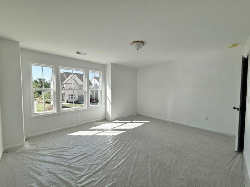 Spacious, unfurnished interior of a new home in Arbors at Richland Creek, Buford (Image 6).