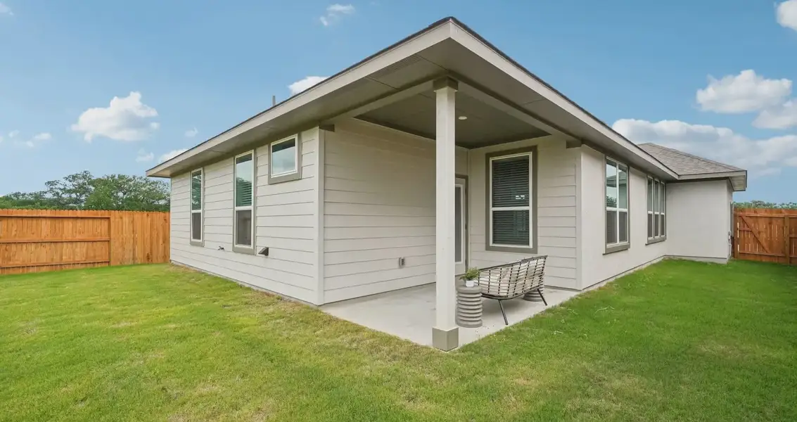 Exterior details and patio area of a home in Stream Waters, Buda (Image 3).
