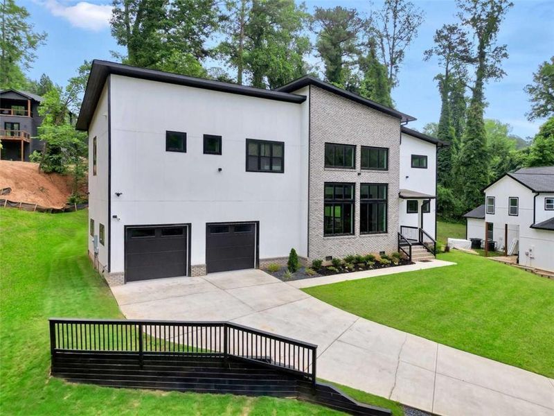 Front exterior of a new home in , Atlanta, GA, highlighting curb appeal (Image 27).