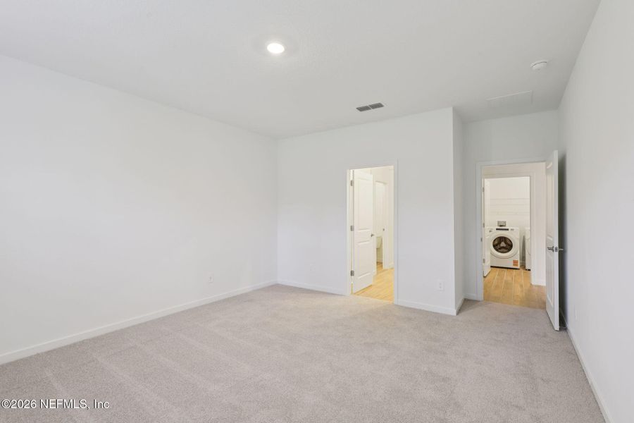 Spacious, unfurnished interior of a new home in Colbert Landings, Palm Coast (Image 23).