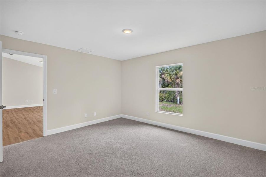 Spacious, unfurnished interior of a new home in , Port Charlotte (Image 15).