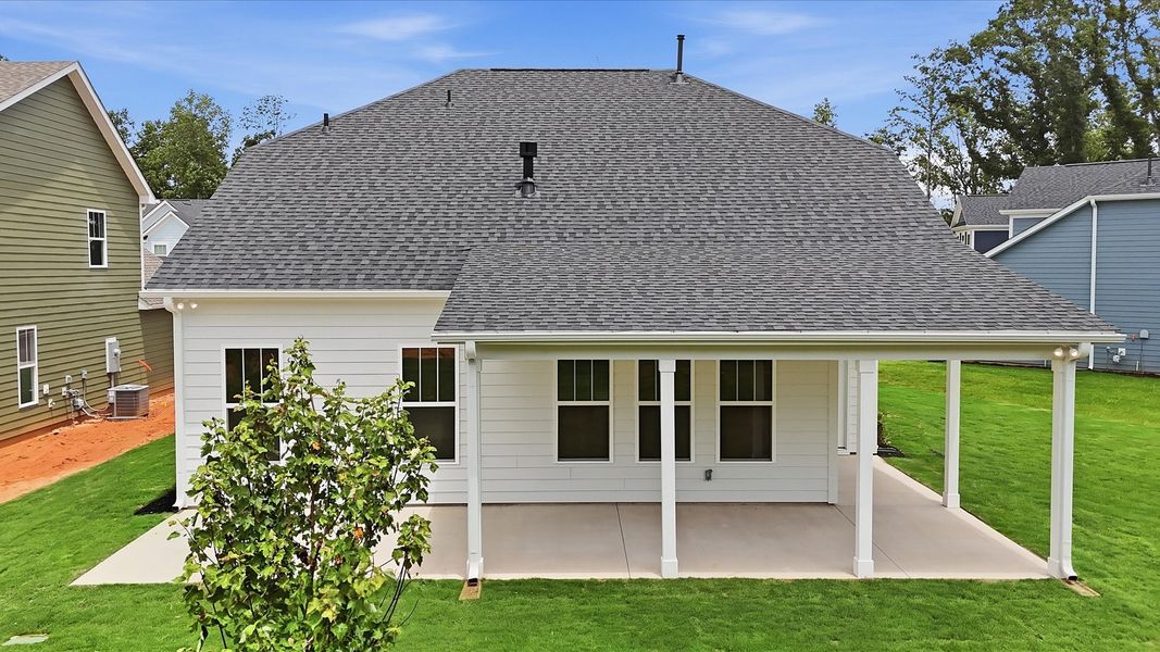 Exterior details and patio area of a home in Creeks at Midway, Anderson (Image 23).