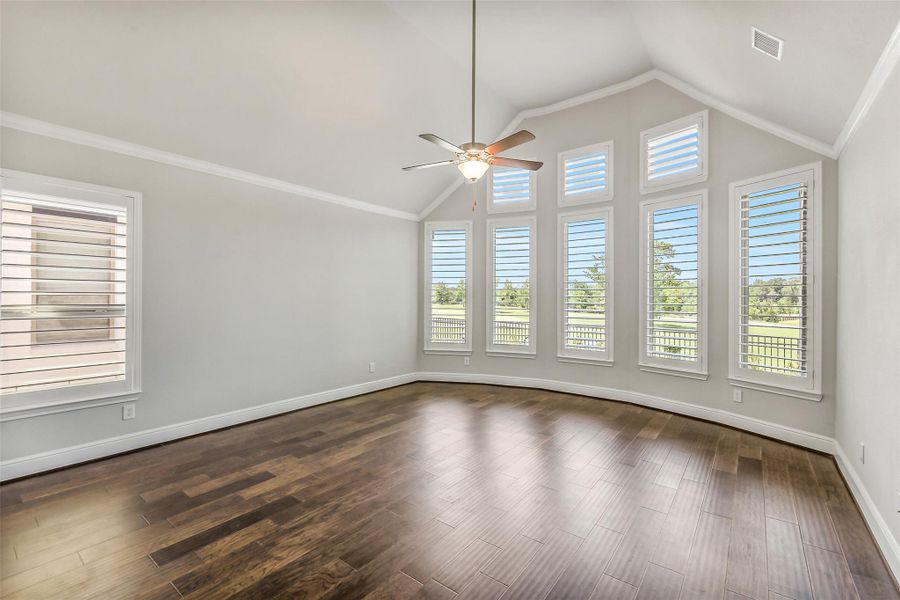 The very large primary bedroom has wall of windows to let in the light when you want it but also has sunburst shutters to soften the light when needed. The very large primary bedroom has wall of windows to let in the light when you want it but also has sunburst shutters to soften the light when needed.