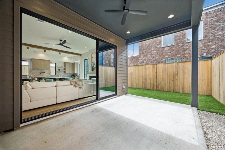 Stackable sliding glass allows for seamless indoor/outdoor living with a large covered patio. Stackable sliding glass allows for seamless indoor/outdoor living with a large covered patio.