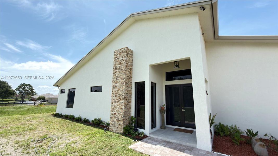 Exterior details and patio area of a home in , Loxahatchee (Image 38).