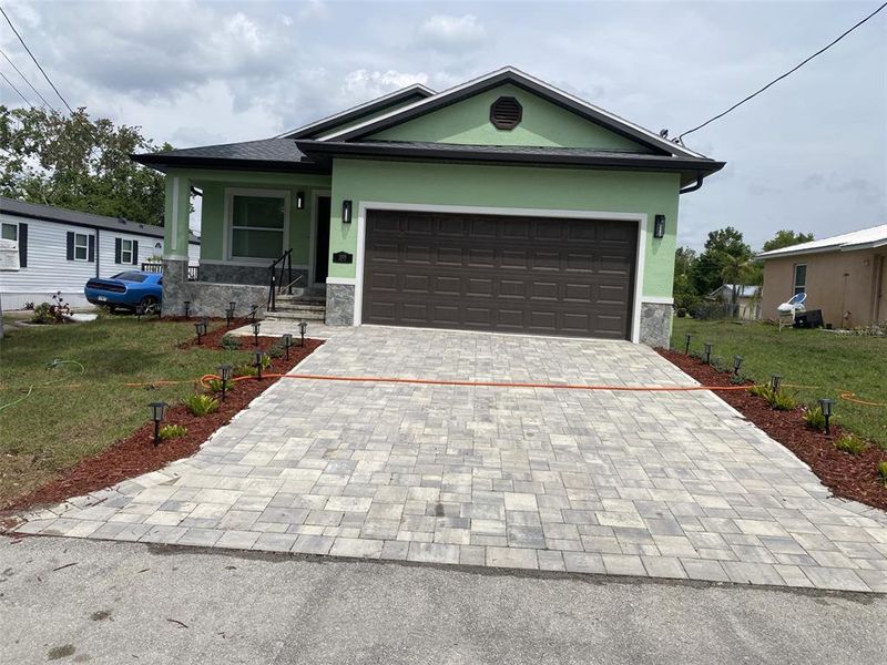 Front exterior of a new home in , Arcadia, FL, highlighting curb appeal (Image 6).