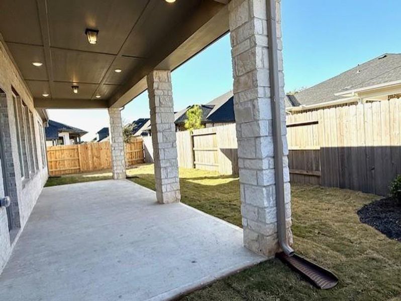 Large covered rear patio provides a great place to relax!