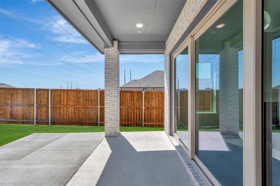 Exterior details and patio area of a home in Wellington, Haslet (Image 18).