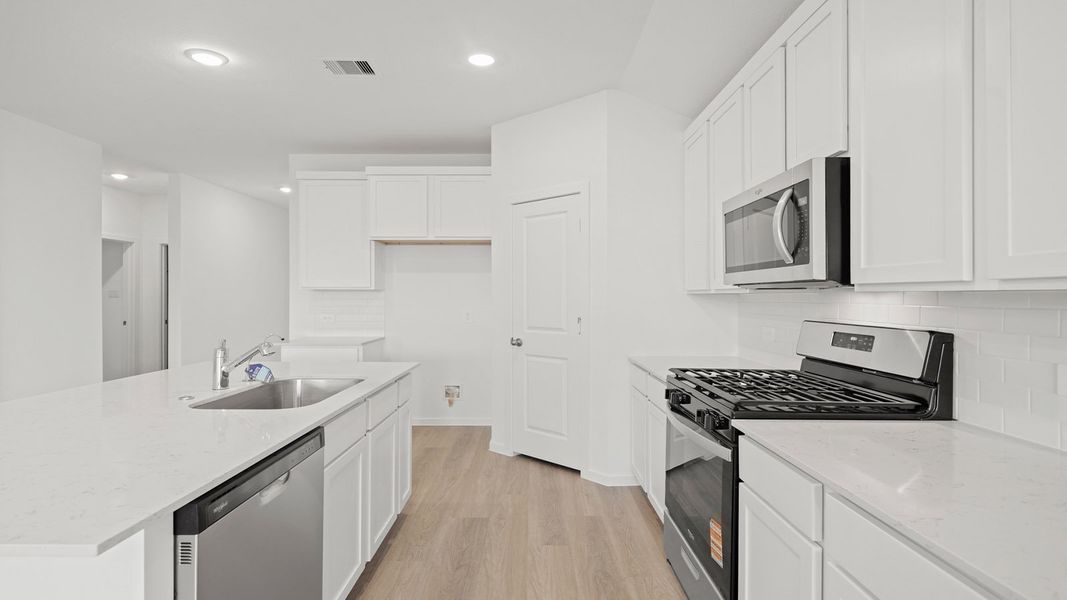 Furnished interior view inside a new home in Sunterra Lakes, Brookshire (Image 12).