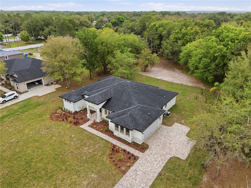 Front exterior of a new home in , Kissimmee, FL, highlighting curb appeal (Image 26).
