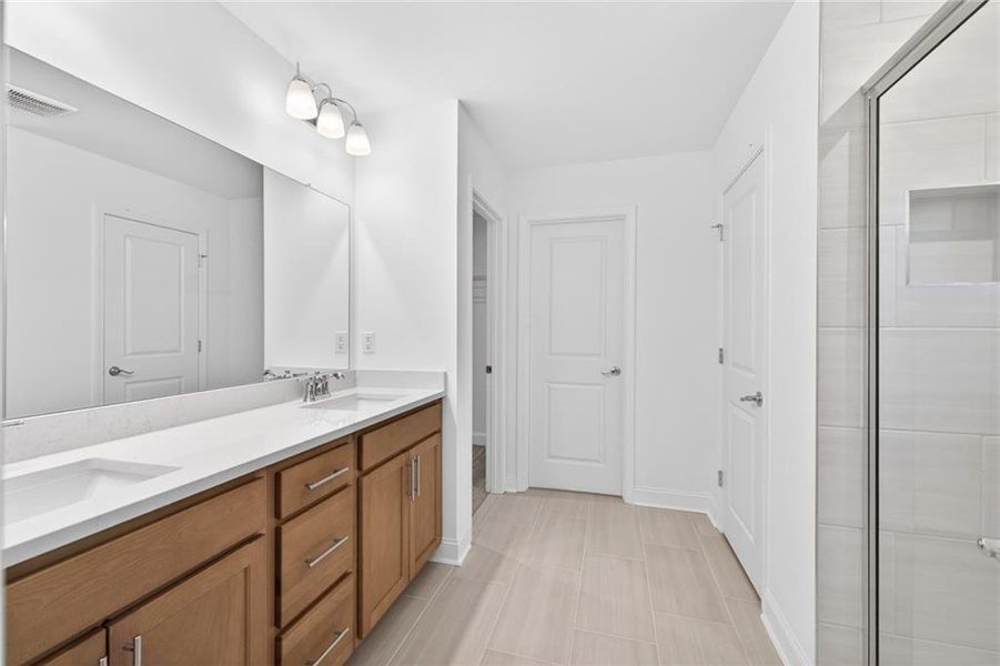 Furnished interior view inside a new home in Riversprings, Dacula (Image 19).