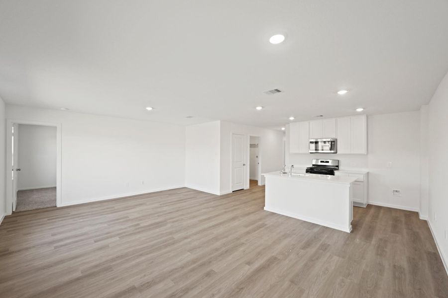 Spacious, unfurnished interior of a new home in The Canopies, Splendora (Image 8).