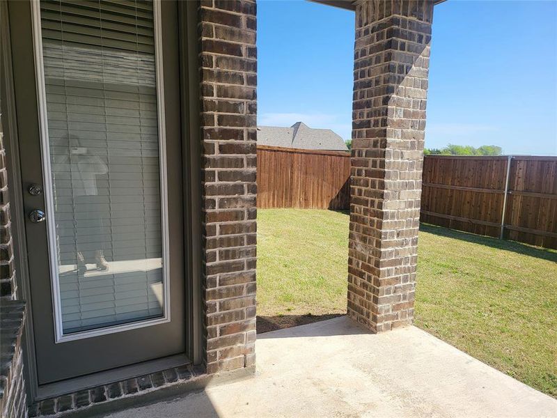 View of patio featuring a fenced backyard