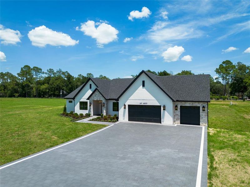 Front exterior of a new home in , Dade City, FL, highlighting curb appeal (Image 29).
