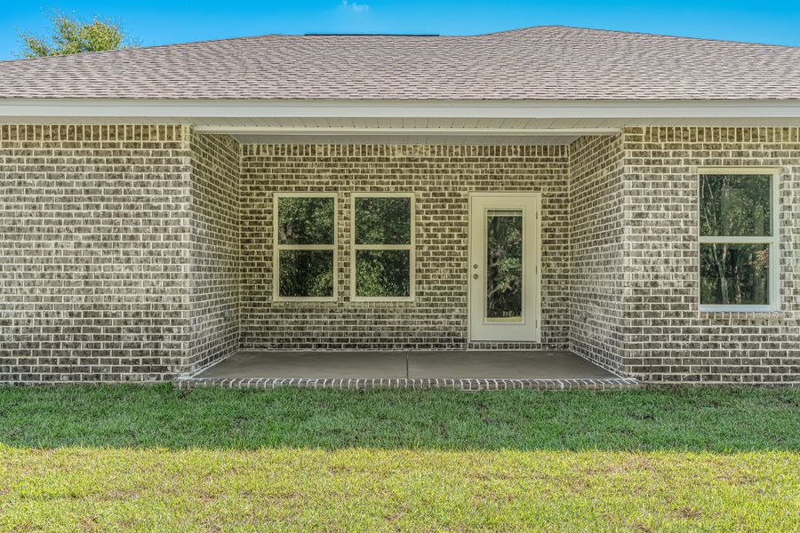 Exterior details and patio area of a home in Southern Day Chateau, Baker (Image 22).