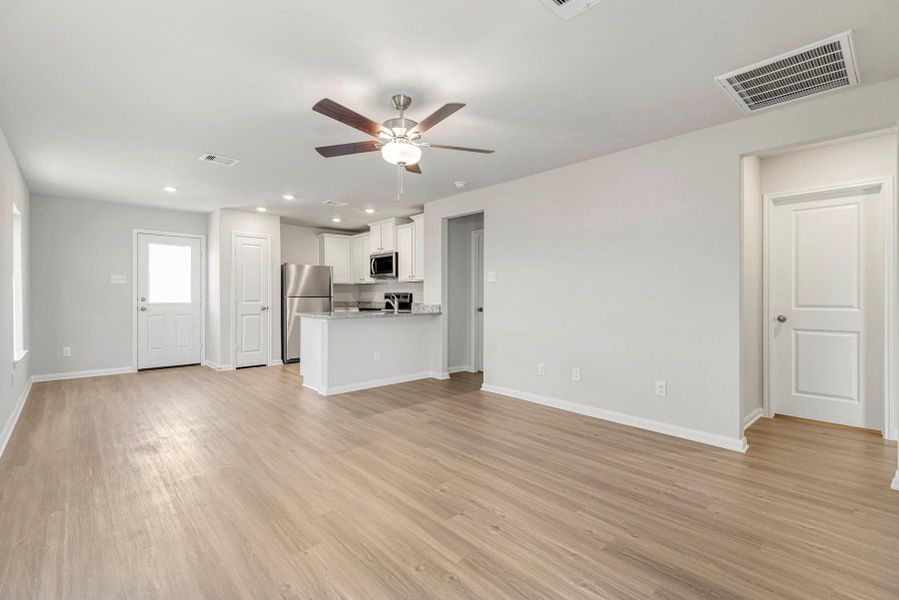 Spacious, unfurnished interior of a new home in Vacek Country Meadows, Richmond (Image 12).