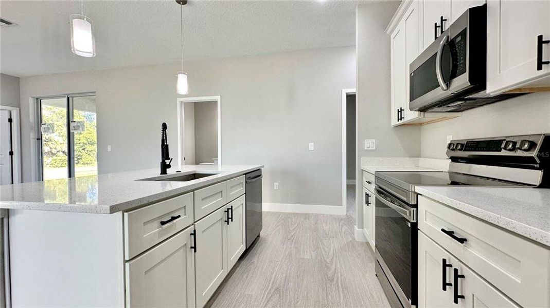 Furnished interior view inside a new home in , Poinciana (Image 9).