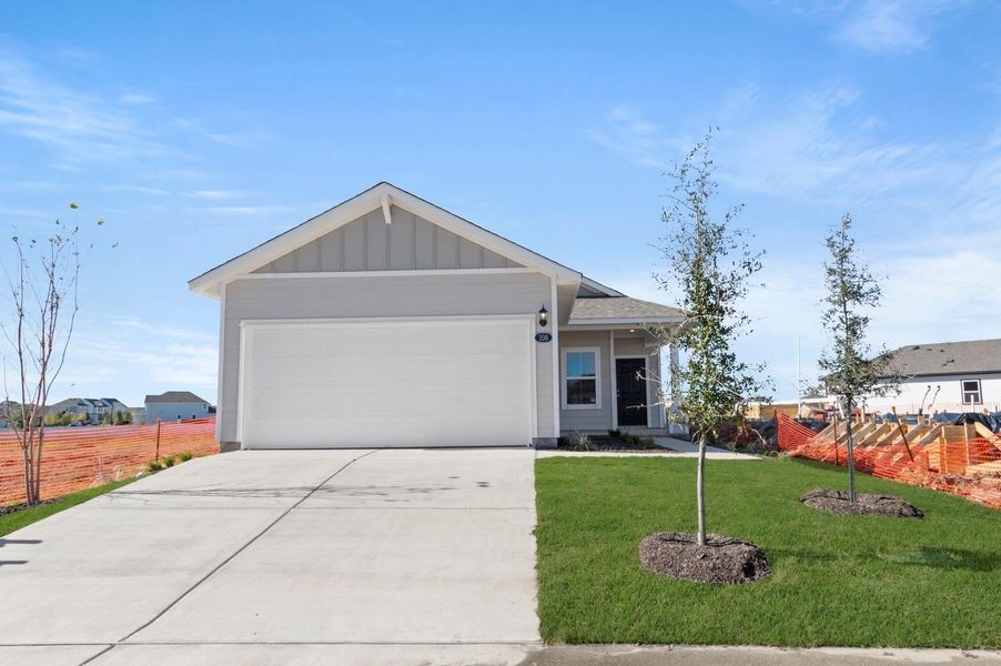 Front exterior of a new home in Harvest Ridge, Elgin, TX, highlighting curb appeal (Image 2).