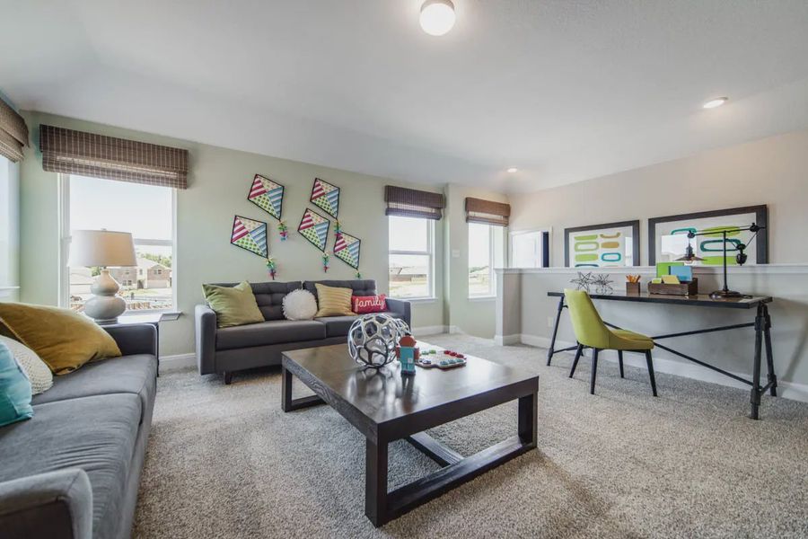 Representative furnished interior of a home built from the Carlisle by Chesmar Homes in Stillwater Ranch, Buda (Image 7).