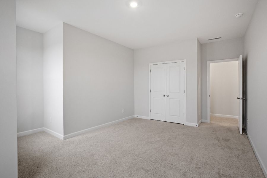 Spacious, unfurnished interior of a new home in Ovation at Sweetbrier, Durham (Image 24).