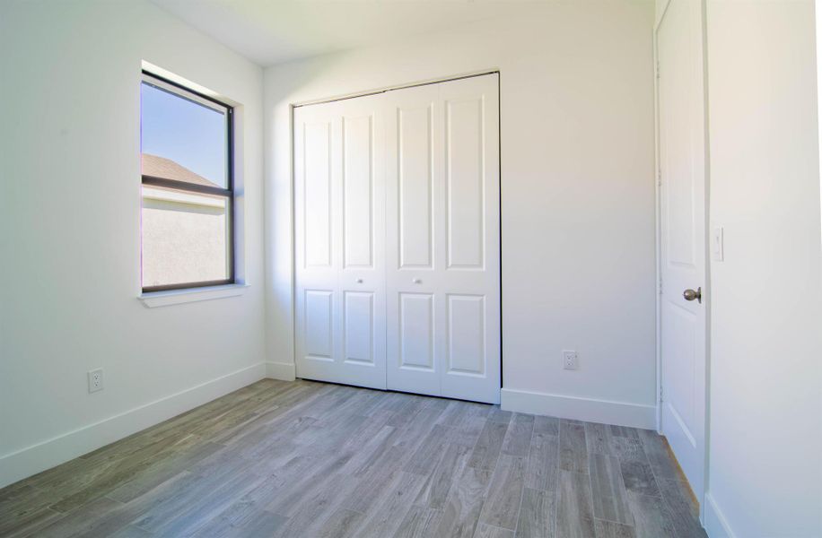 Spacious, unfurnished interior of a new home in , Port Charlotte (Image 27).
