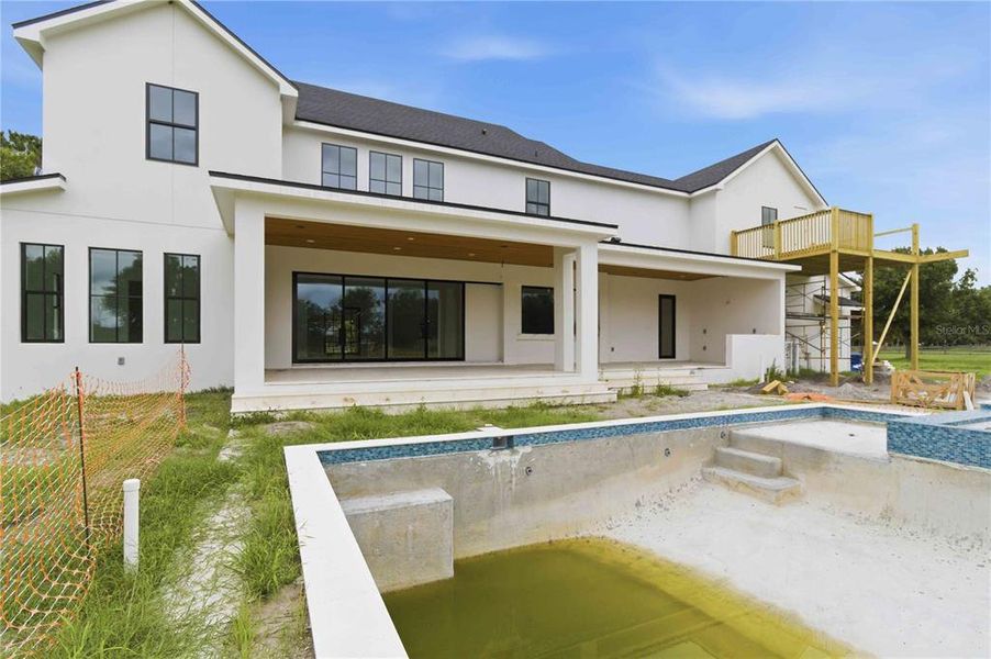 Exterior details and patio area of a home in , Sarasota (Image 16).