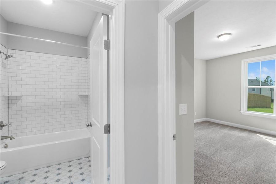 Downstairs Bedroom & Bathroom | 5511 Sweetwater Drive, Main-Level Suite Downstairs Bedroom & Bathroom | 5511 Sweetwater Drive, Main-Level Suite