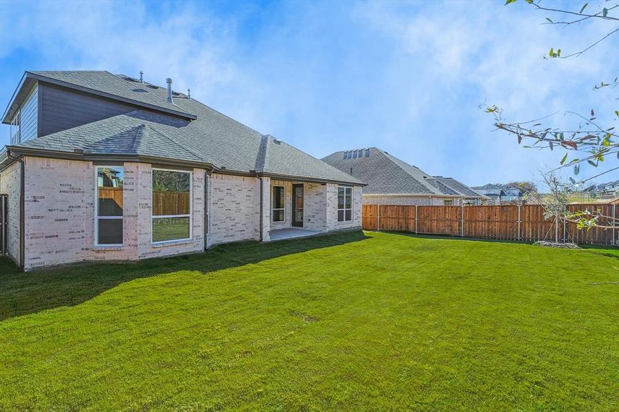 Front exterior of a new home in , Argyle, TX, highlighting curb appeal (Image 19).