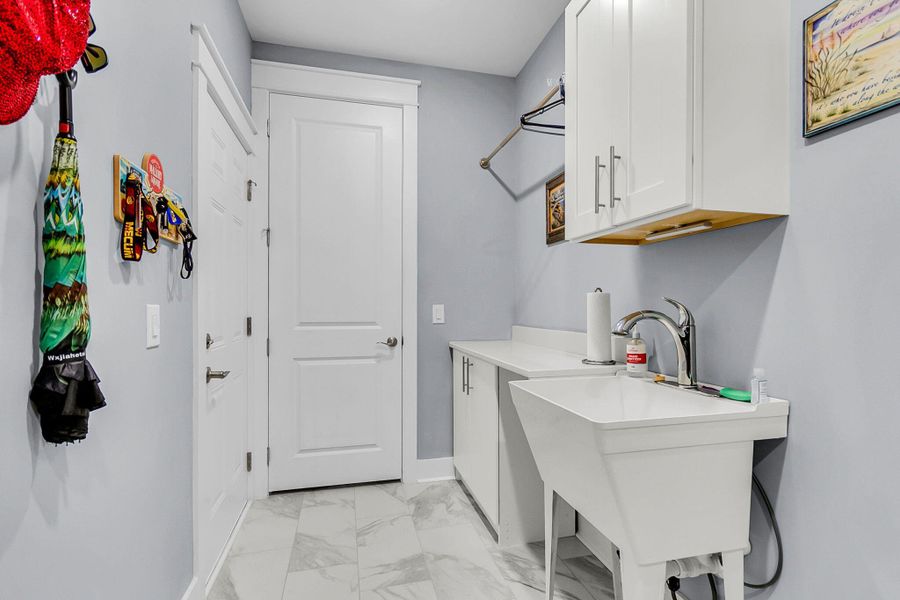 Furnished interior view inside a new home in K. Hovnanian's® Four Seasons at Lakes of Cane Bay, Summerville (Image 43).