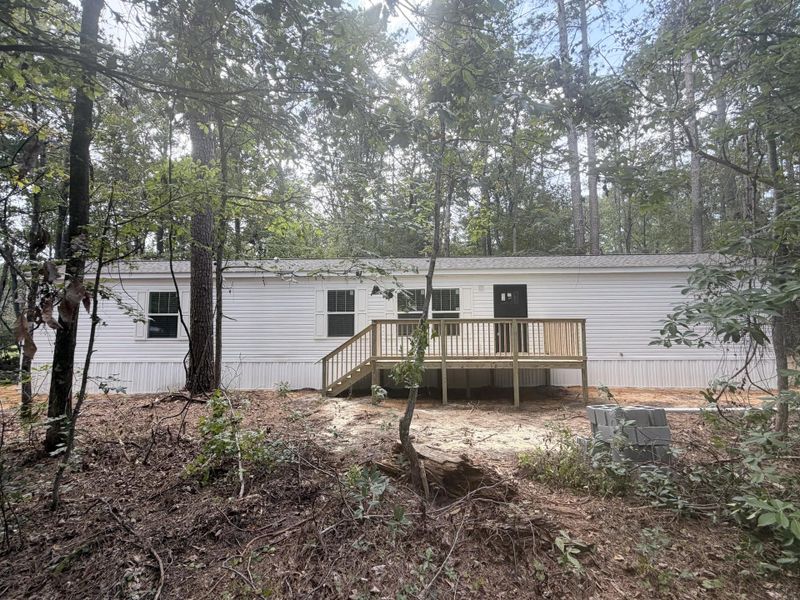Exterior details and patio area of a home in , Round O (Image 12).