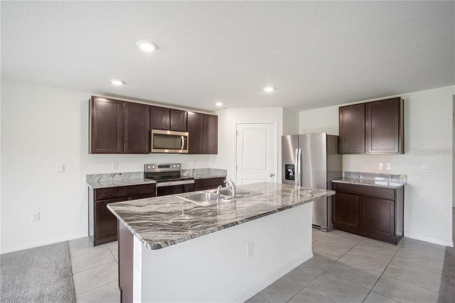 Furnished interior view inside a new home in Abbott Park, Zephyrhills (Image 10).