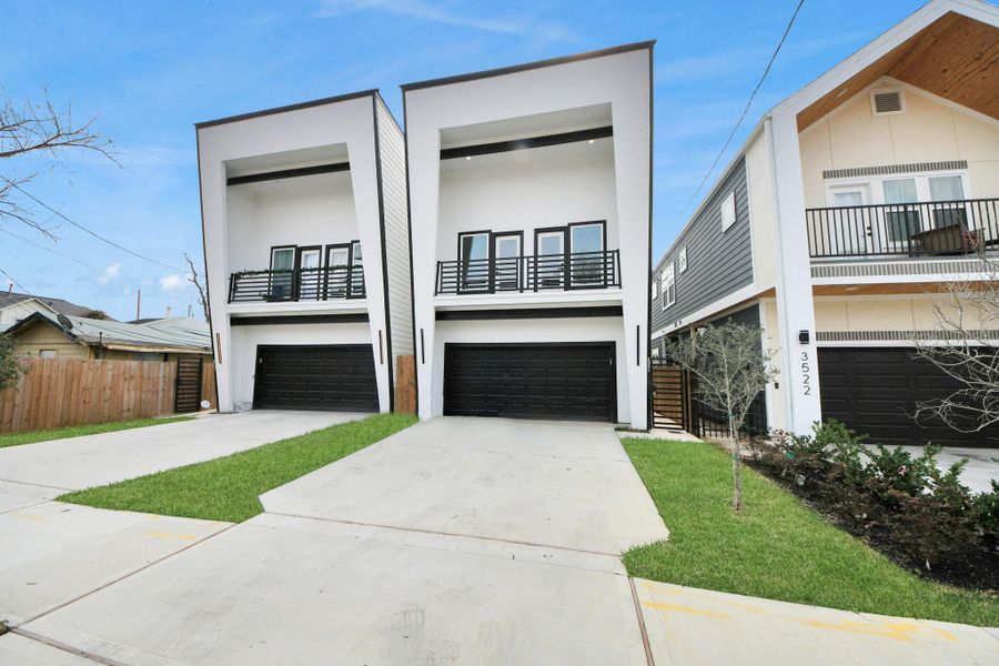 Front exterior of a new home in , Houston, TX, highlighting curb appeal (Image 20).