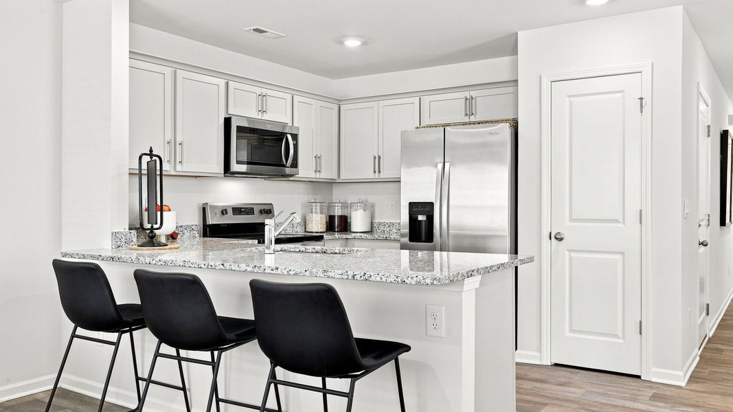 Furnished interior view inside a new home in The Townes at Hunter Hill, Rocky Mount (Image 7).