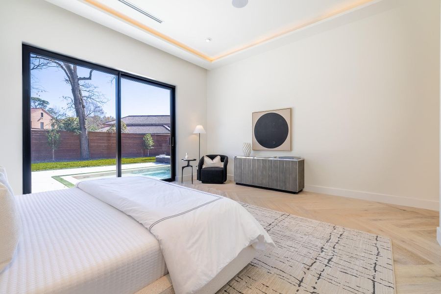 Reverse angle of the primary bedroom showcasing scale and layout. Reverse angle of the primary bedroom showcasing scale and layout.