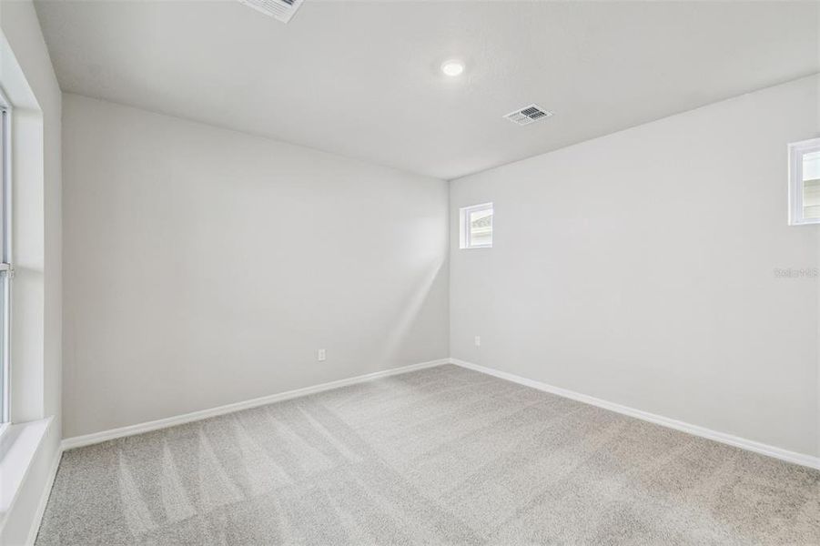 Spacious, unfurnished interior of a new home in Weslyn Park in Sunbridge 34', St. Cloud (Image 51).