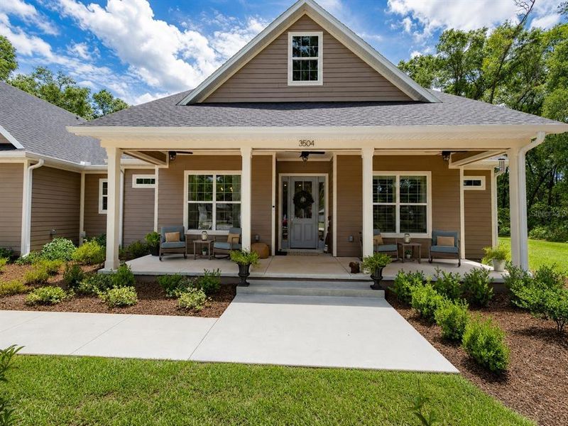 Front exterior of a new home in , Deland, FL, highlighting curb appeal (Image 2). Front exterior of a new home in , Deland, FL, highlighting curb appeal (Image 2).