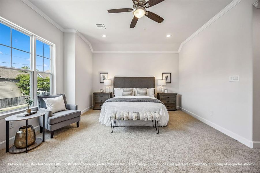 Primary Sanctuary: Elegance meets comfort with standard crown molding, ample space for a king-sized bed, and oversized nightstands, creating the perfect retreat to unwind and recharge.