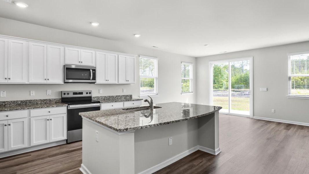 Furnished interior view inside a new home in Magnolia Ridge at Blake Farm, Wilmington (Image 8).