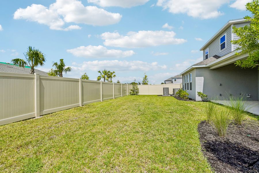 Exterior details and patio area of a home in Firethorn, Parrish (Image 4).