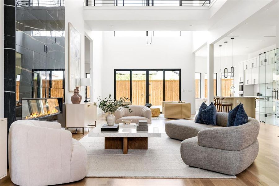 Common area featuring a towering ceiling Common area featuring a towering ceiling