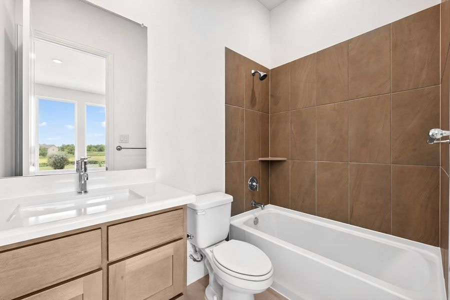 Furnished interior view inside a new home in The Ranch at Uptown Celina, Celina (Image 10).
