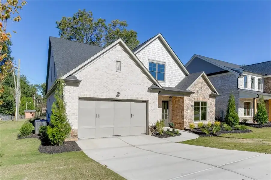 Front exterior of a new home in , Buford, GA, highlighting curb appeal (Image 28).