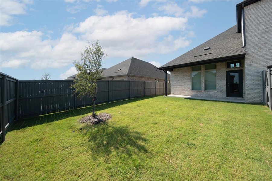 Front exterior of a new home in , Venus, TX, highlighting curb appeal (Image 16).